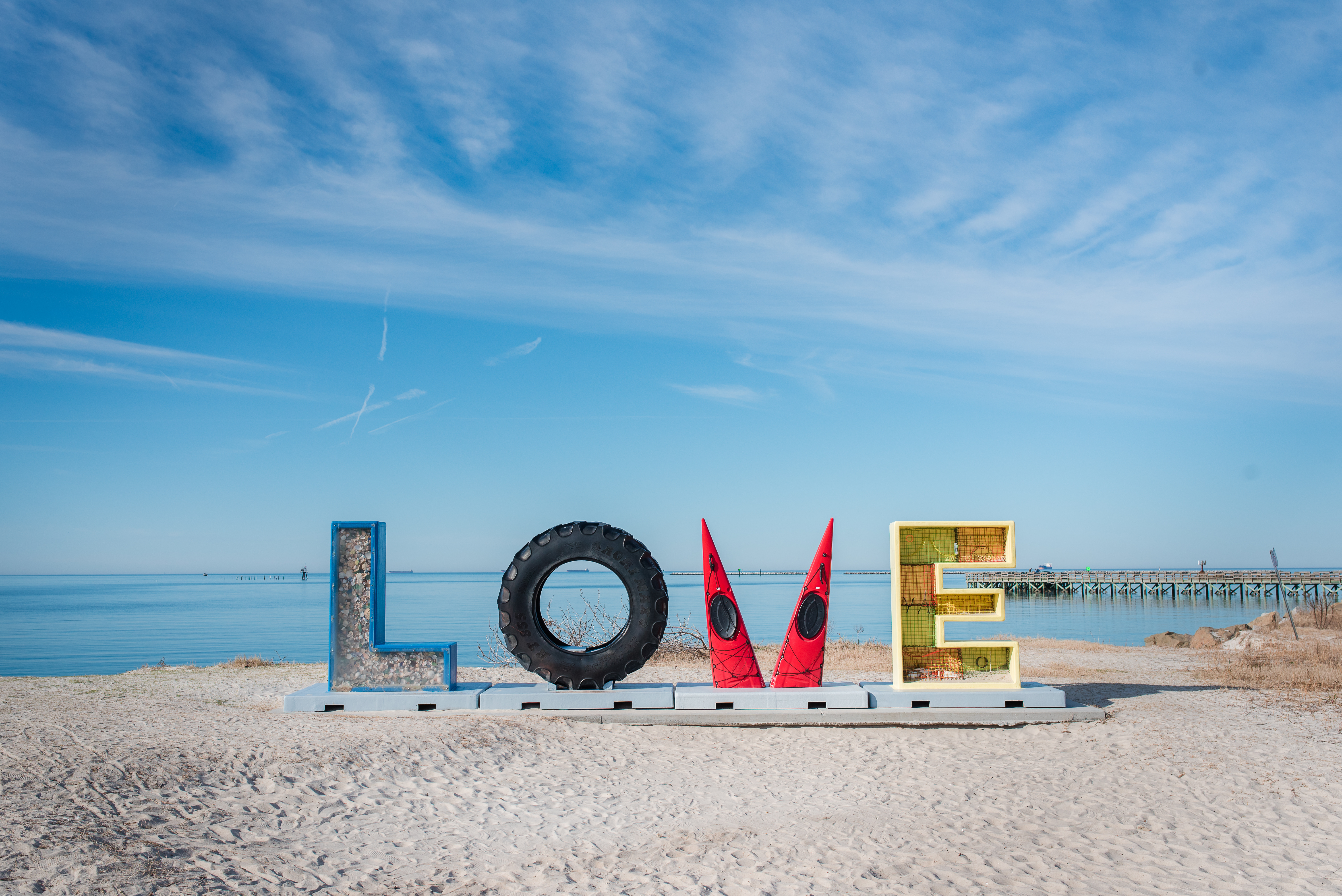 LOVE Sign with Bright Blue Sky